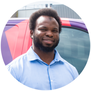 Photograph of Sanni Salisu looking at the camera and smiling