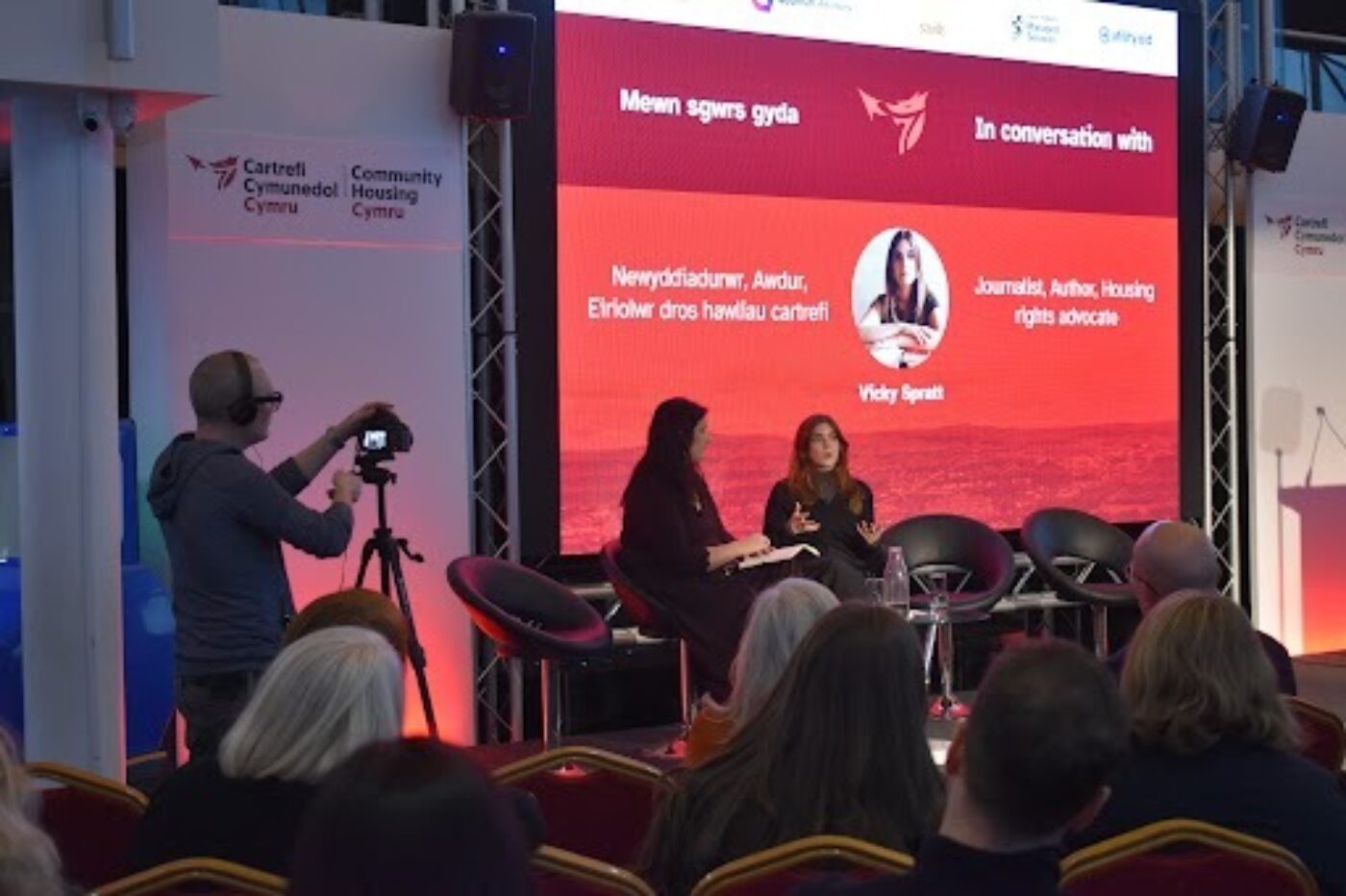 Delegates listen to a conversation between CHC's Deputy CEO Clarissa Corbisiero (left) and Vicky Spratt (right)