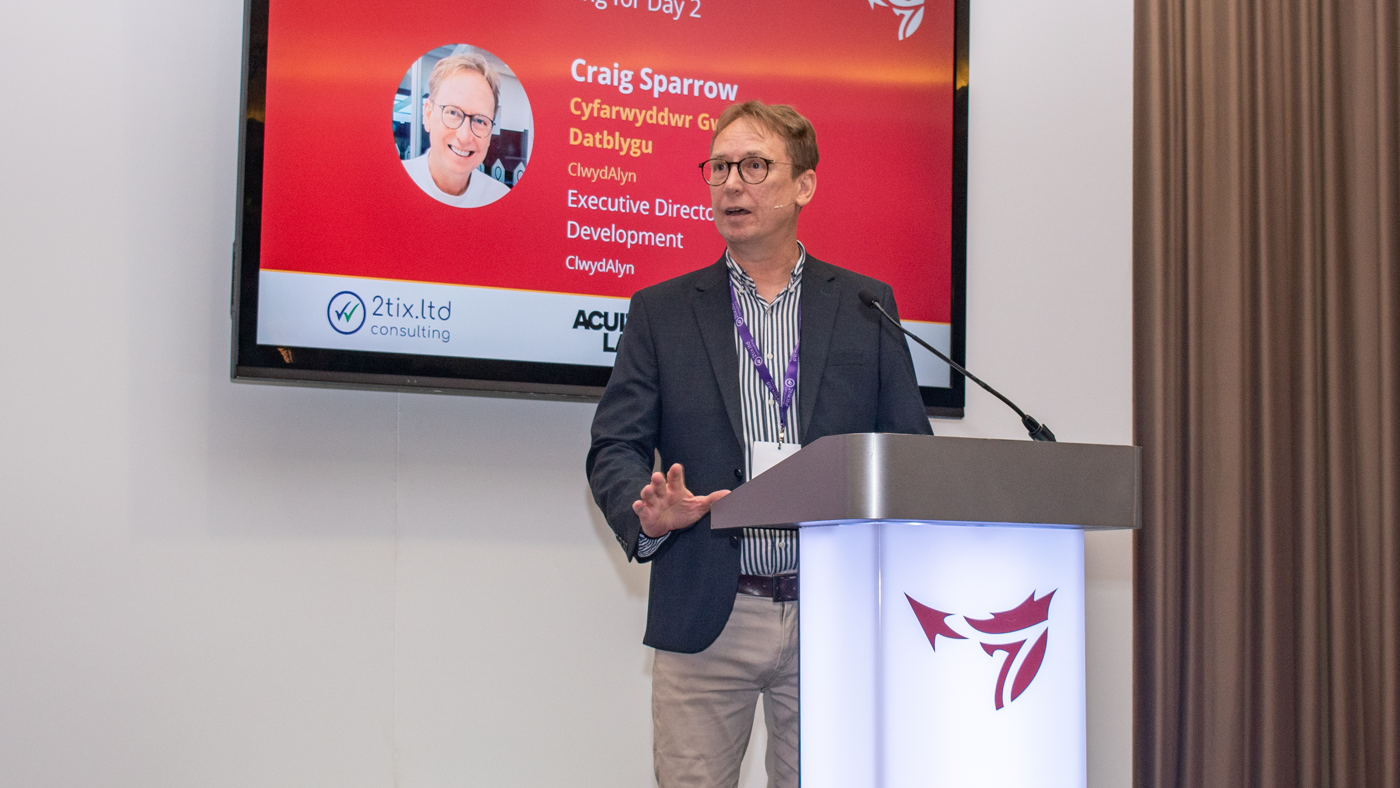 Craig Sparrow speaking on stage during the One Big conference.