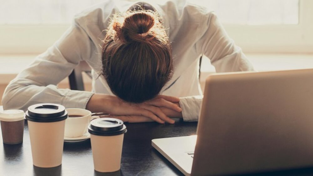 What impact can wellbeing programmes have on staff retention?